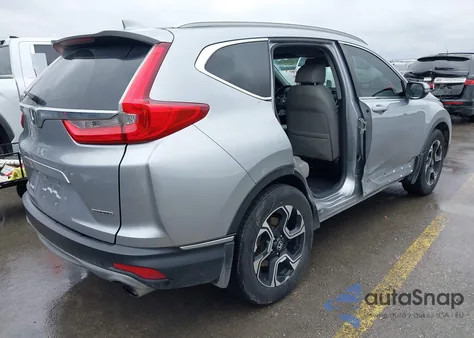 2019 Honda Cr-V Touring from USA, damaged, VIN 7FARW1H93KE014627